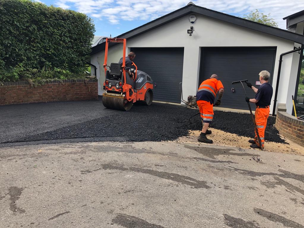 This is a photo of a bitumen driveway which is in the process of being installed by Beaudesert Asphalt & Bitumen Surfacing