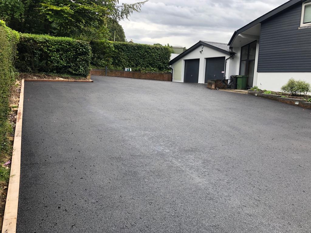 This is a photo of a asphalt driveway which is in the process of being installed by Beaudesert Asphalt & Bitumen Surfacing